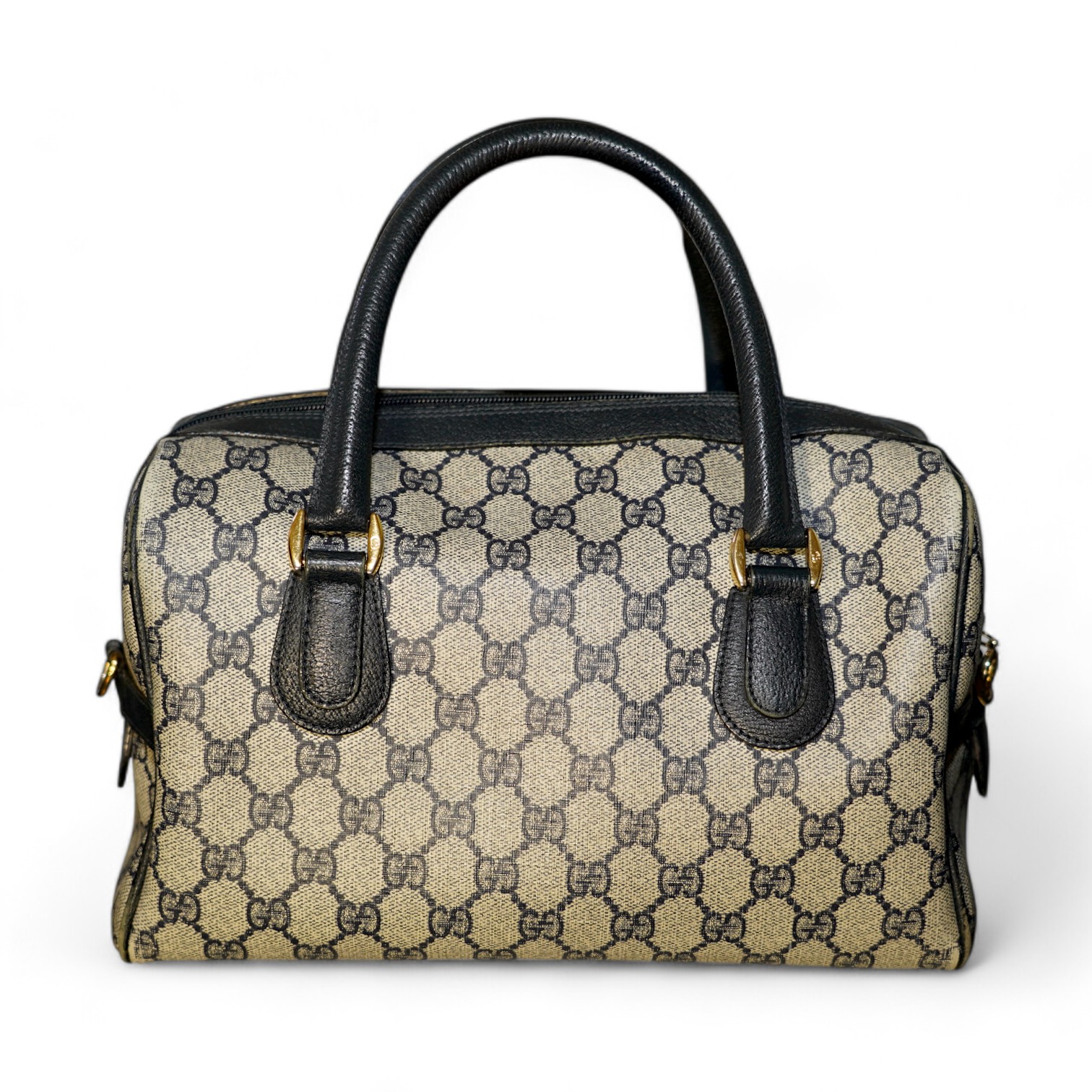 A Gucci monogram blue canvas handbag, wallet and purse